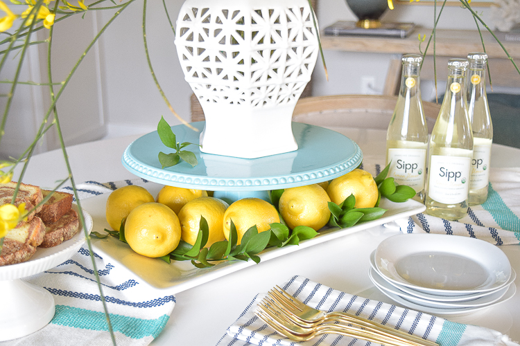 aqua cake stand lemons table scape spring brunch