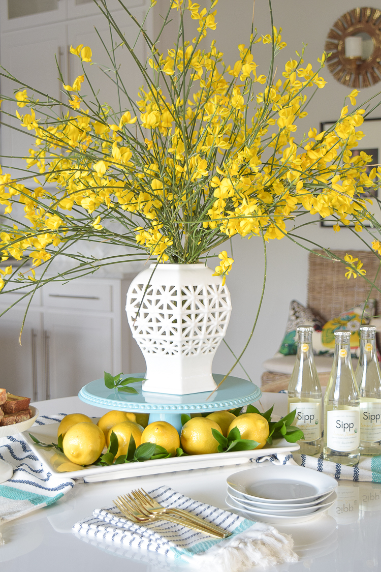 White vase spring summer dishes aqua cake stand forsythia yellow flower bush brunch lemons table scape center piece_-14