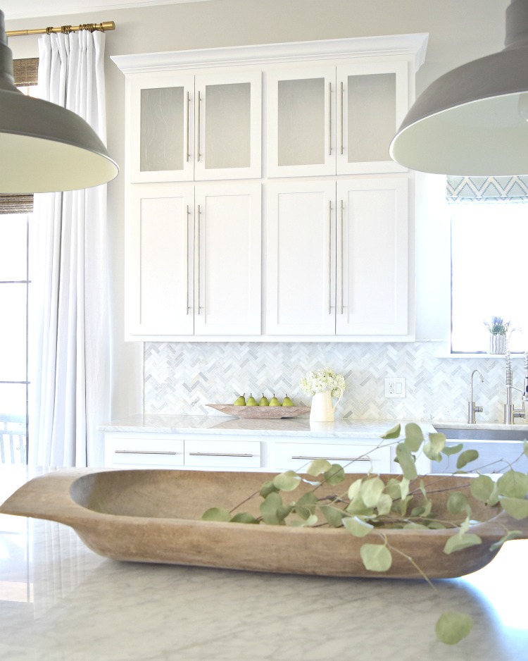 white kitchen herringbone backsplash dough bowl barn pendants carrara countertops