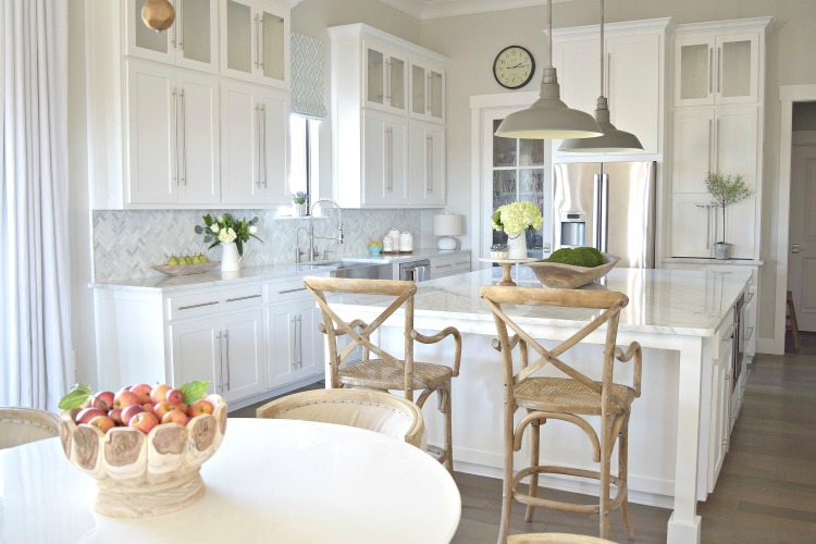 white kitchen modern shaker cabinets RH pendants carrara marble