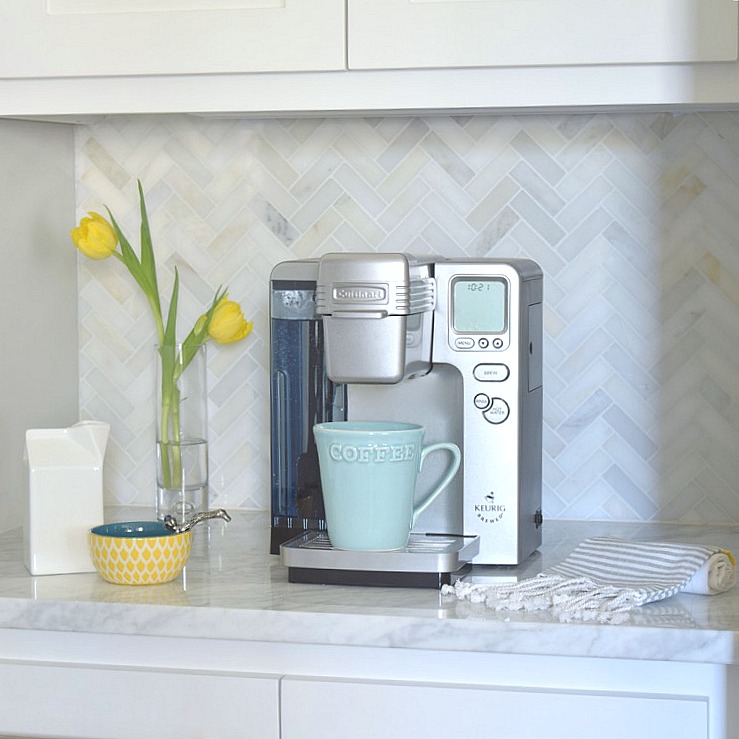 carrara marble herringbone backsplash