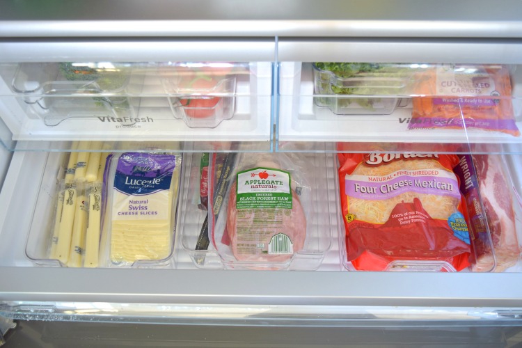 Organized refrigerator meat cheese drawer