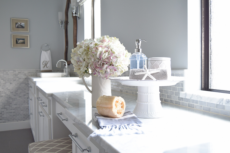 decorating a cake stand pink hydrangea flower arrangement white bathroom