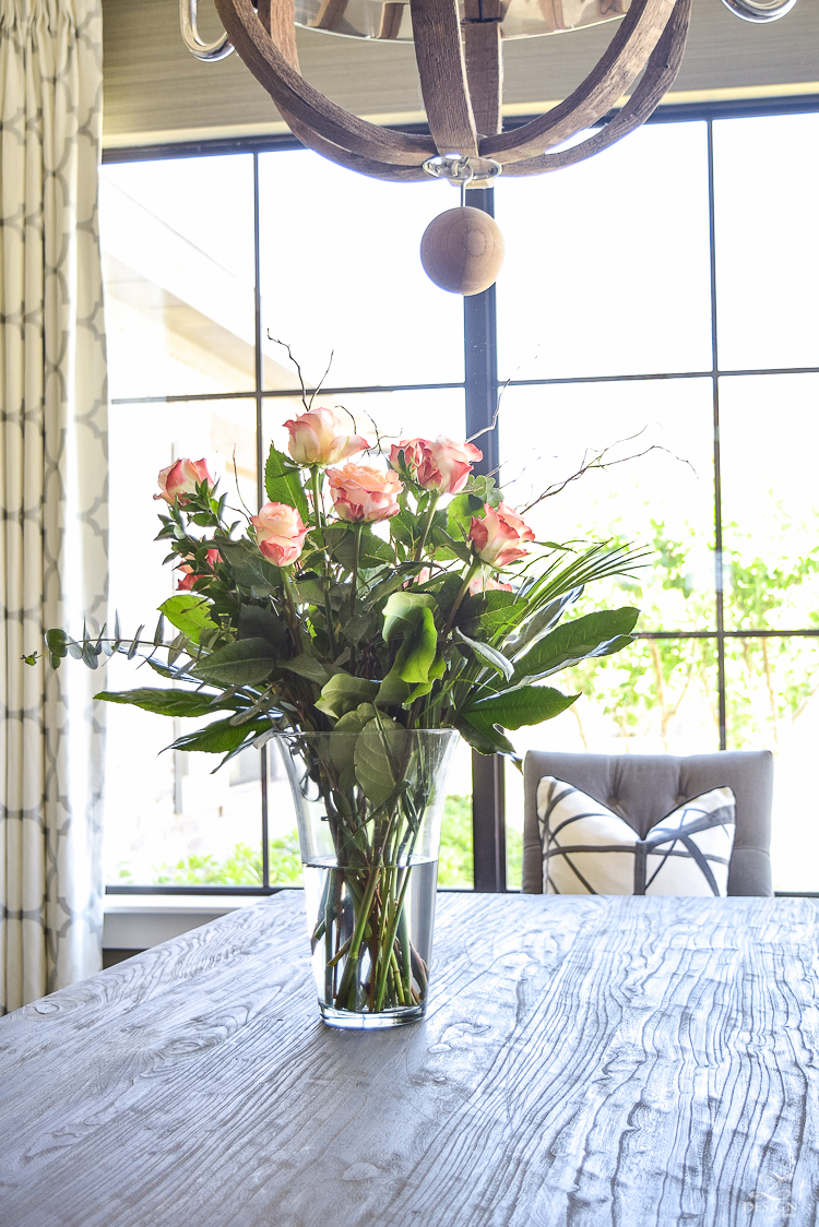 varigated roses rustic dining room kelley wearstler channels pillow in ebony kravet riad curtains in silver_