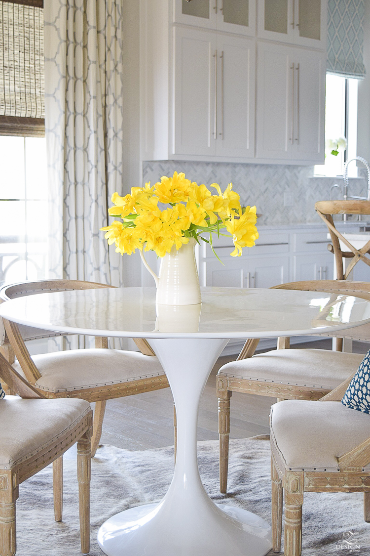 yellow tulips white tulip table white kitchen