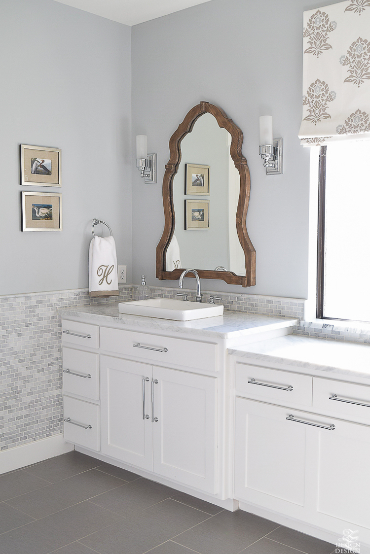 White transitional bathroom wood mirror white cabinets carrara marble-1