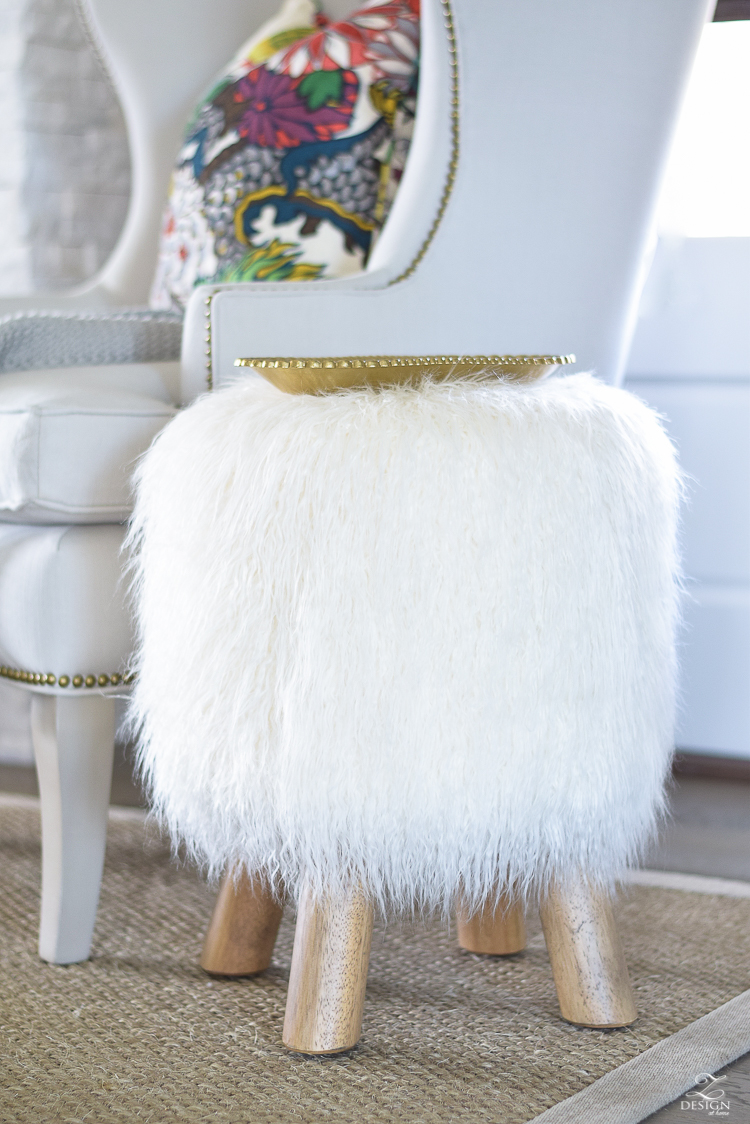 white-transitional-fall-living-room-chiang-mia-dragon-fabric-pillow-leaopard-pillows-fur-stools-kravet-riad-curtains-10