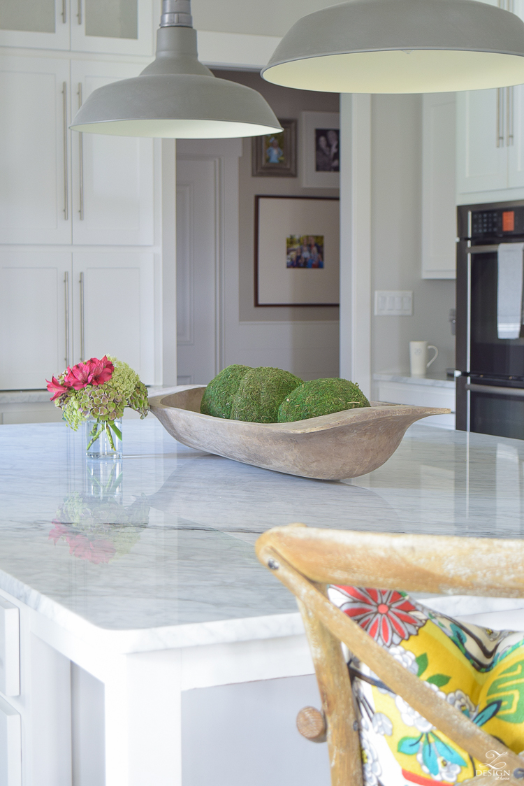 carrara-marble-kitchen-island-bread-bowl-moss-balls-white-farmhouse-kitchen-herringbone-backsplash-3