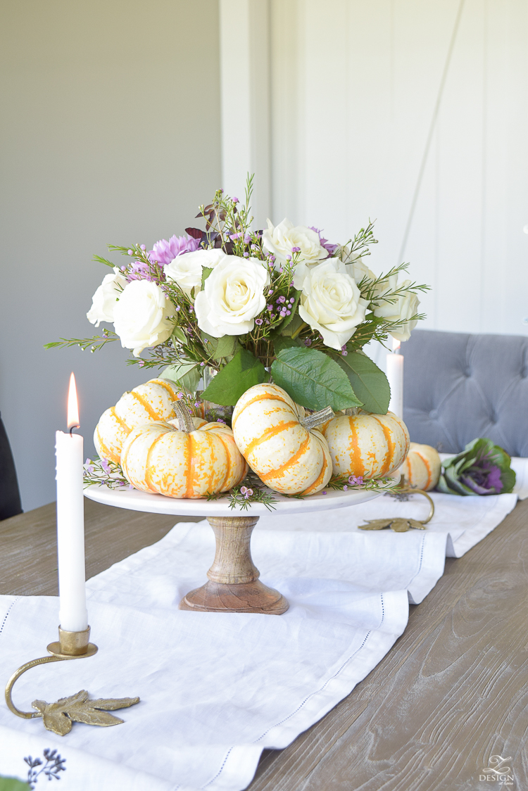 easy-fall-pumpkin-centerpiece-white-linen-table-runner-brass-leaf-candlesticks-dining-room-1