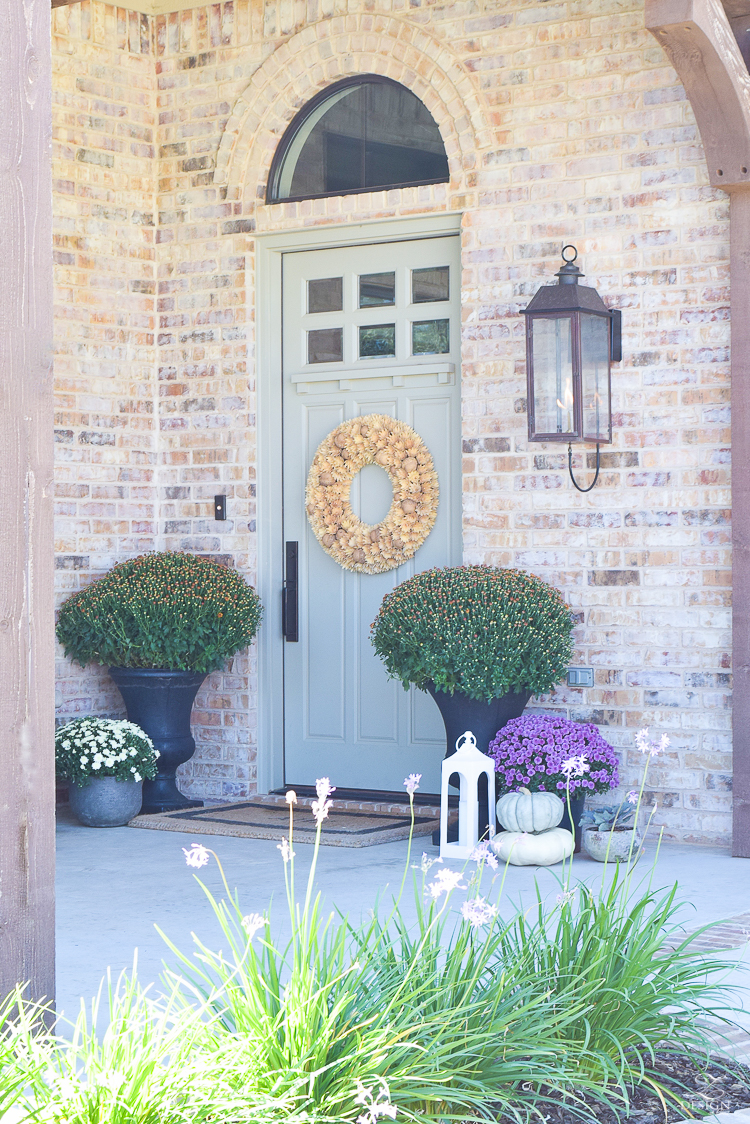 fall-front-porch-fall-flowers-mums-black-planters-mission-style-door-sherwin-williams-exterior-paint-color-mortor-washed-brick-outdoor-bench-monogrammed-coir-door-mat-22