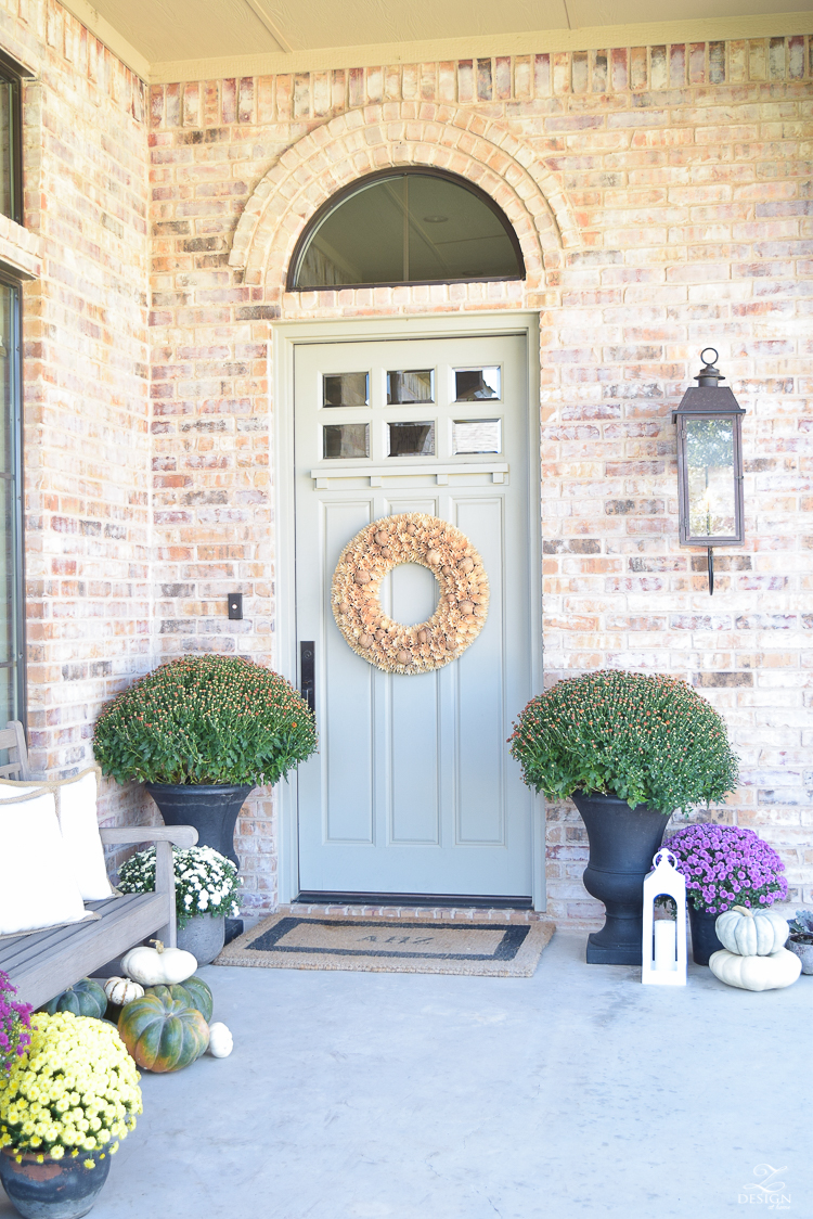 fall-front-porch-fall-flowers-mums-black-planters-mission-style-door-sherwin-williams-exterior-paint-color-mortor-washed-brick-outdoor-bench-monogrammed-coir-door-mat-8