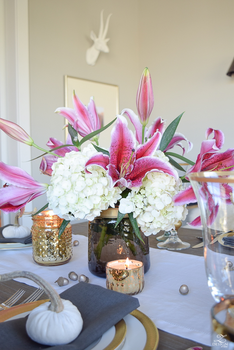 thanksgiving-table-scape-black-velvet-chairs-vintage-inspired-blue-rug-kravet-riad-curtains-gray-washed-dining-table-white-hydrangeas-plum-lillies-11