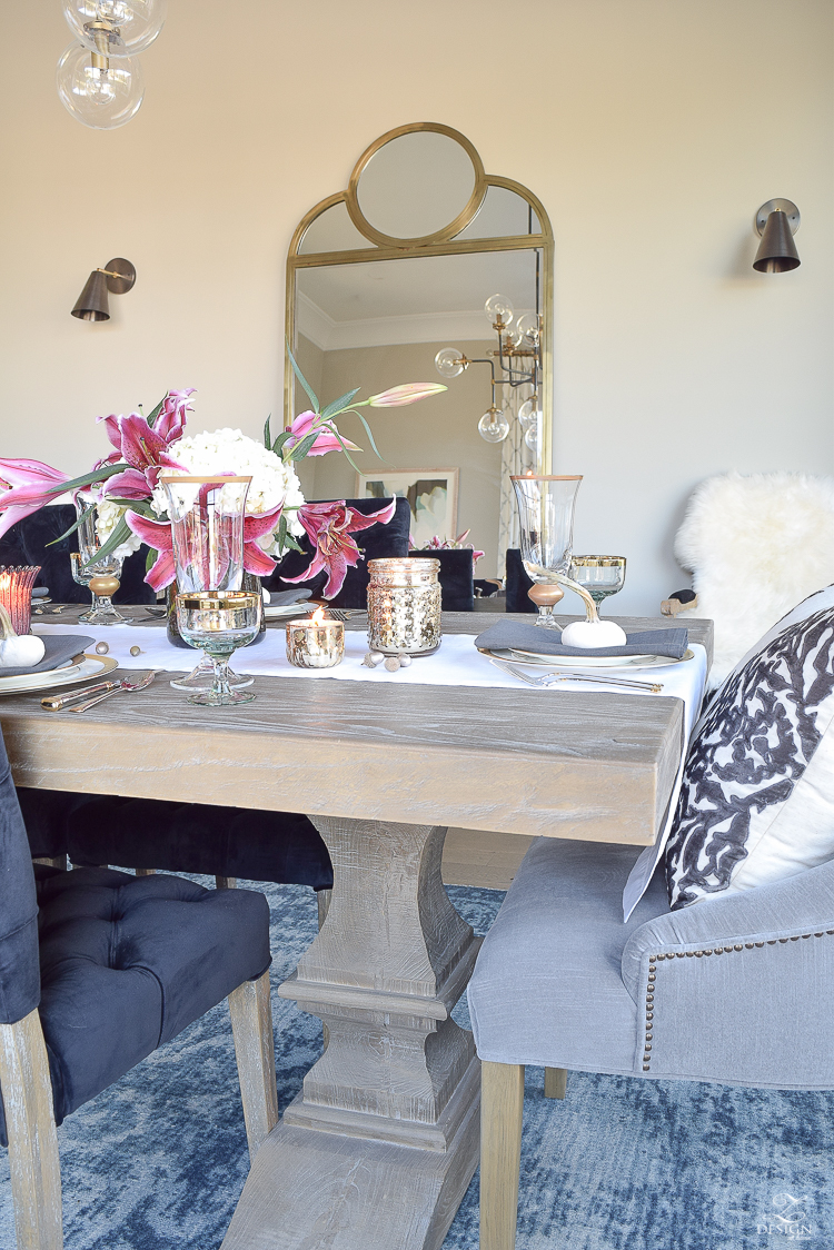 thanksgiving-table-scape-black-velvet-chairs-vintage-inspired-blue-rug-kravet-riad-curtains-gray-washed-dining-table-white-hydrangeas-plum-lillies-17