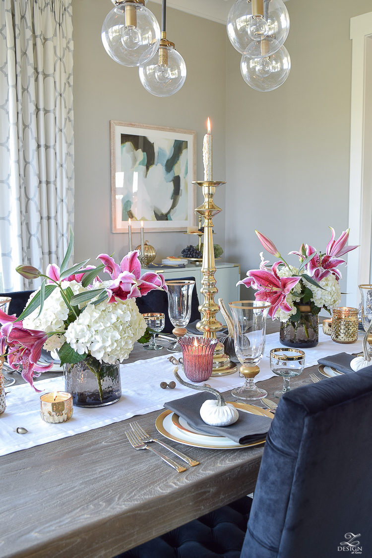 thanksgiving-table-scape-black-velvet-chairs-vintage-inspired-blue-rug-kravet-riad-curtains-gray-washed-dining-table-white-hydrangeas-plum-lillies-5