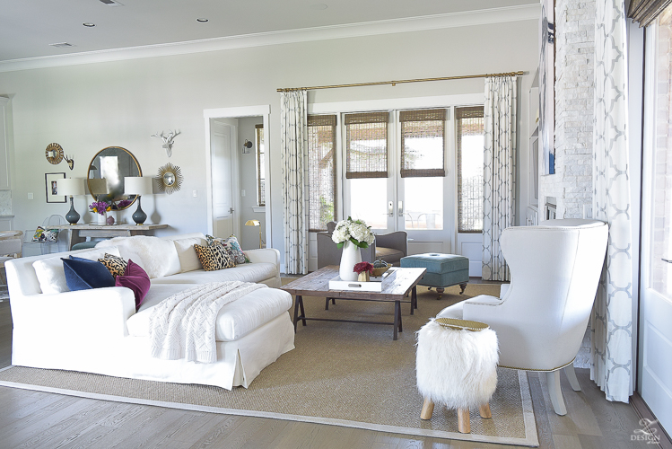 white-transitional-fall-living-room-chiang-mia-dragon-fabric-pillow-leaopard-pillows-fur-stools-kravet-riad-curtains-7