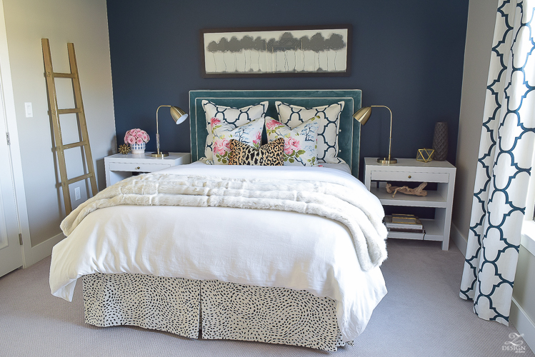 cozy-chic-bedrrom-gold-ladder-navy-wall-gentlemans-gray-white-modern-side-tables-teal-headboard-kravet-riad-navy-fabric-pillows-curtains-gray-carpet-best-gold-spray-paint-1