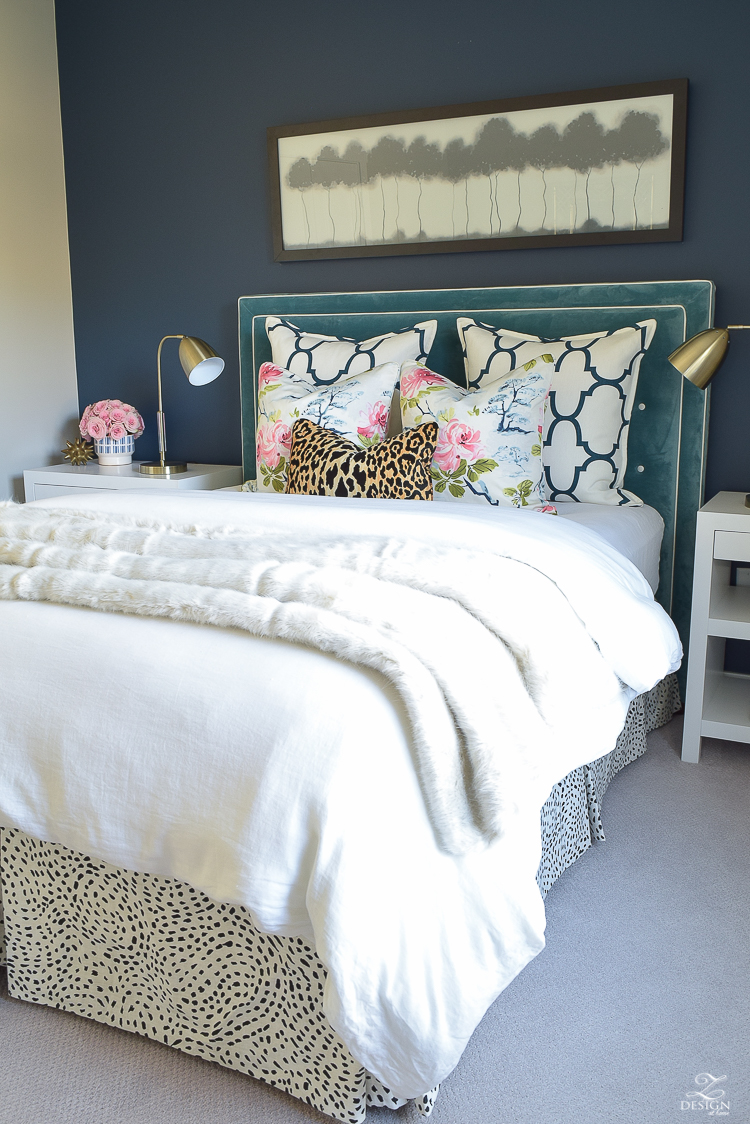 custom-bedskirt-dalmation-fabric-white-faux-fur-throw-benjamin-moore-gentlemans-gray-paint-floral-and-leopard-pillows-white-linen-bedding-brass-lamps-2