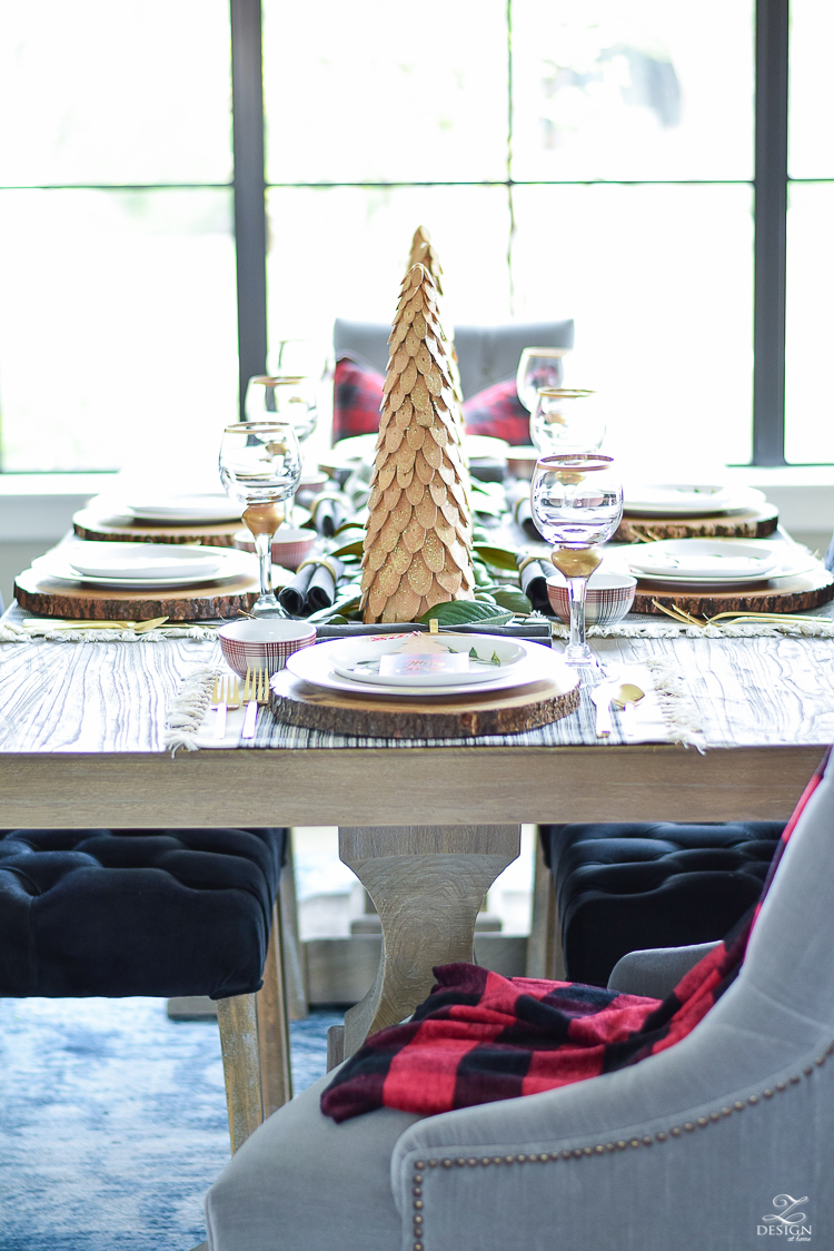 christmas-tour-wood-themed-table-setting-plaid-bowl-magnolia-garland-black-tufted-chairs-2