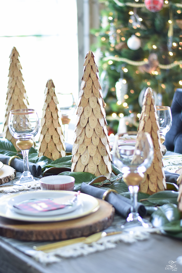 christmas-tour-wood-themed-table-setting-plaid-bowl-magnolia-garland-black-tufted-chairs-5