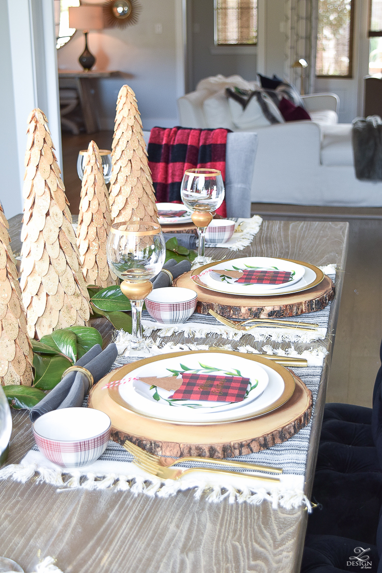 gold-flatware-gold-napkin-rings-fringe-placemats-wooden-placemats-magnolida-garland-christmas-table-setting-5