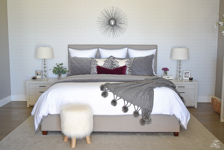 neutral-gray-and-white-bedroom-geometric-wallpaper-gray-nightstands-white-bedding-with-gray-border-gray-velvet-quilt-and-shams-11