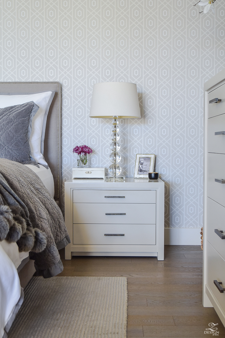 neutral-gray-and-white-bedroom-geometric-wallpaper-gray-nightstands-white-bedding-with-gray-border-gray-velvet-quilt-and-shams-8