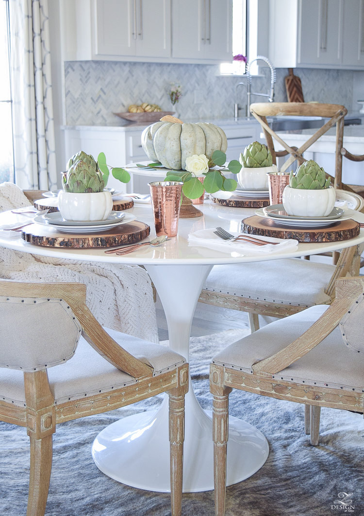 wood-slice-place-mat-white-tulip-table-copper-flatware-copper-tumbler-white-modern-farmhouse-kitchen-thanksgiving-entertaining-table-scape-2