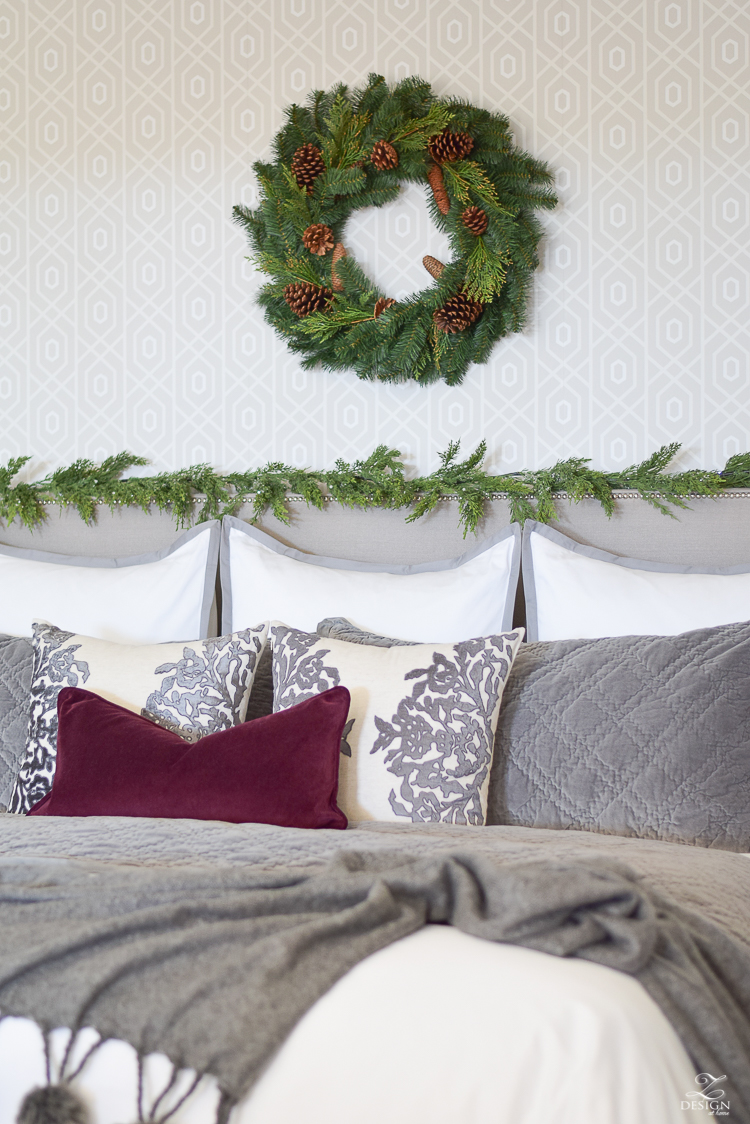 bedroom-christmas-home-tour-chirstmas-bedding-round-faceted-mirror-white-christmas-decor-flocked-tree-geometric-wallpaper-6