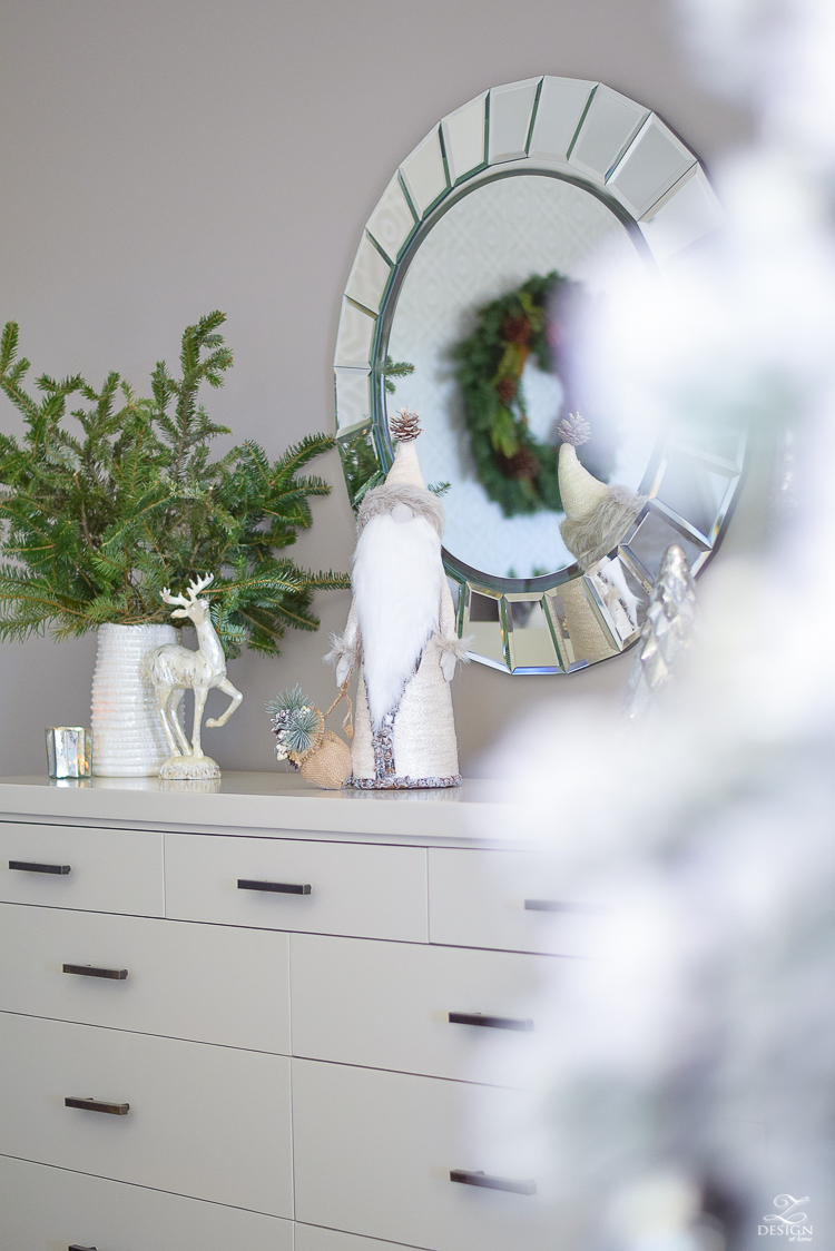 bedroom-christmas-home-tour-chirstmas-bedding-round-faceted-mirror-white-christmas-decor-flocked-tree-geometric-wallpaper-7