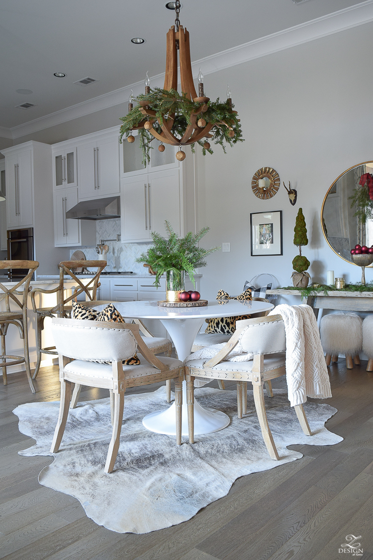 christmas-home-tour-round-gold-mirror-christmas-styling-decor-white-tulip-table-natural-garland-7