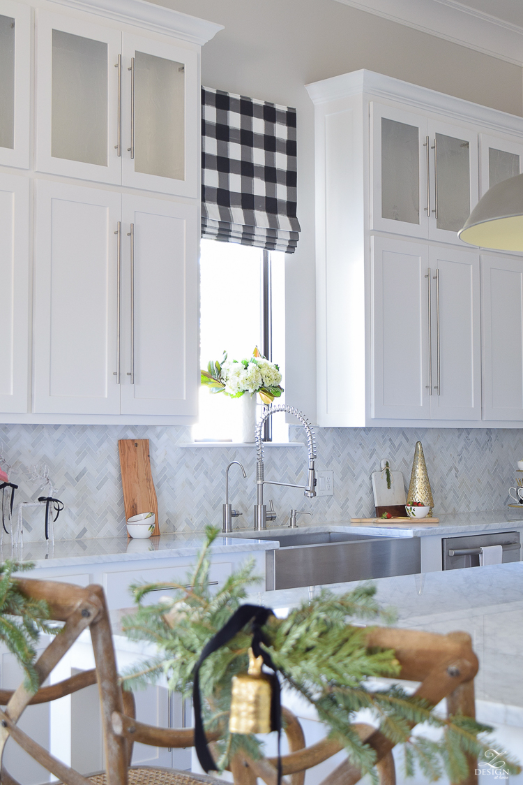 the-drawn-company-faux-roman-shade-with-caitlin-wilson-buffalo-check-fabric-white-farmhouse-kitchen-with-white-carrara-marble-and-herringbone-backsplash-1