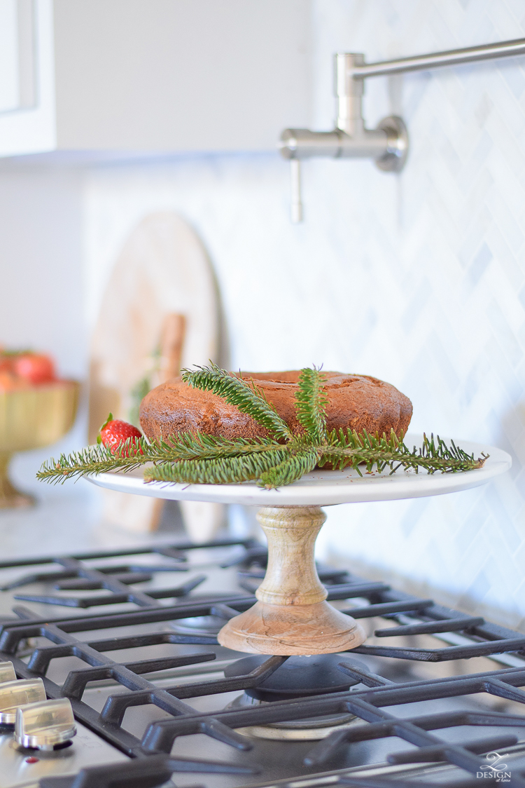 white-modern-farmhouse-kitchen-with-white-carrara-marble-and-white-herringbone-backsplash-christmas-deocr-for-the-kitchen-vintage-barn-pendants-large-dough-bowl-11