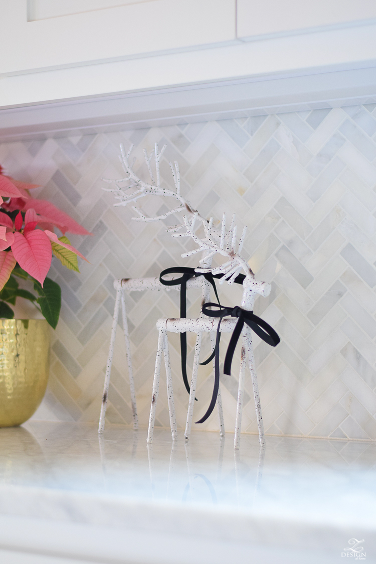 white-modern-farmhouse-kitchen-with-white-carrara-marble-and-white-herringbone-backsplash-christmas-deocr-for-the-kitchen-vintage-barn-pendants-large-dough-bowl-5