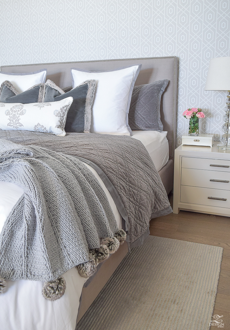 transitional modern gray and white bedroom how to make a bed pom pom throw fur trim pillows velvet bedding gray linen upholstered headbaord thibaut geometric wallpaper-4