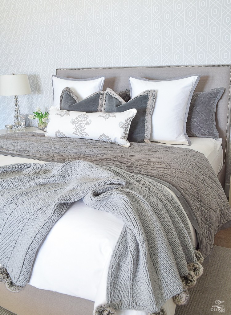 transitional modern gray and white bedroom how to make a bed pom pom throw fur trim pillows velvet bedding gray linen upholstered headbaord thibaut geometric wallpaper-5