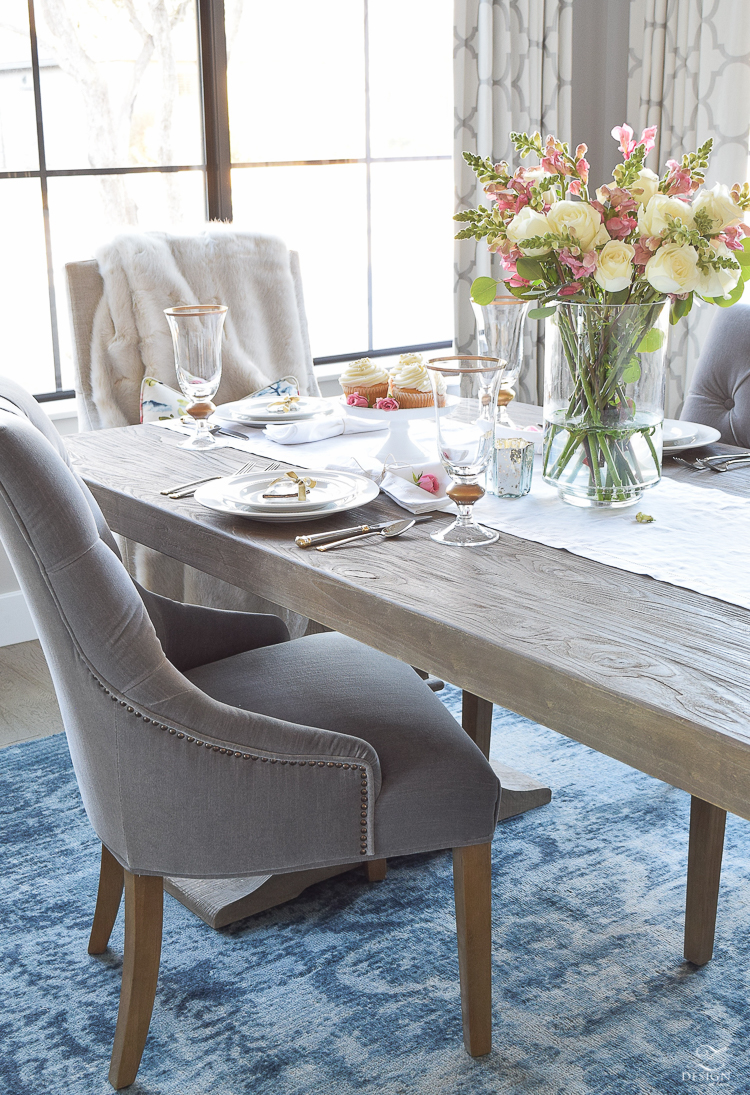 valentines table scape with white and pink roses pink snap dragons gray washed dining table white dishes eternal gold flatware-2