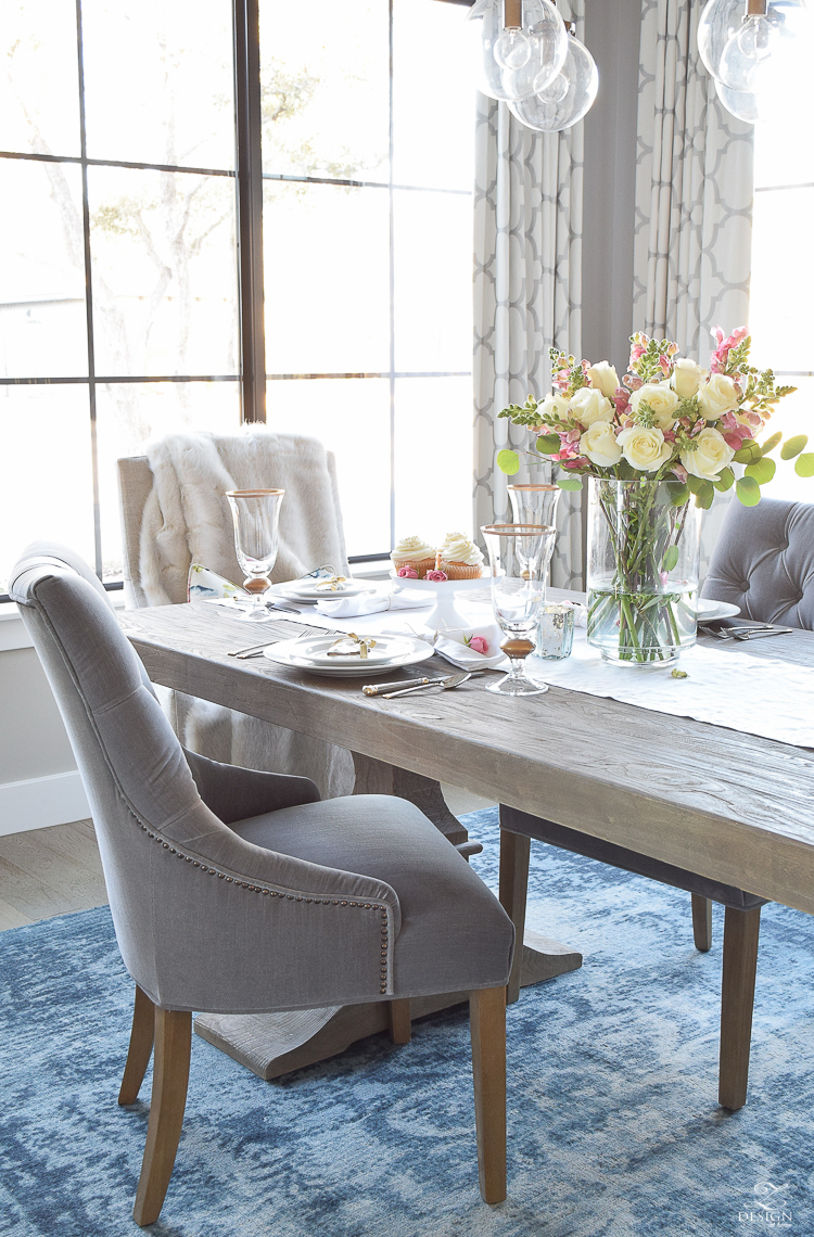 valentines table scape with white and pink roses pink snap dragons gray washed dining table white dishes eternal gold flatware-3