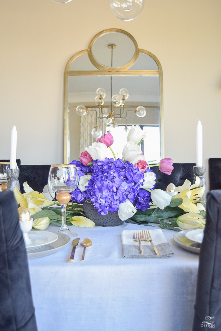 Modern Easter Tablescape Gold Floor Mirror Juju Hat gold flatware gray dishes white linen table cloth-1