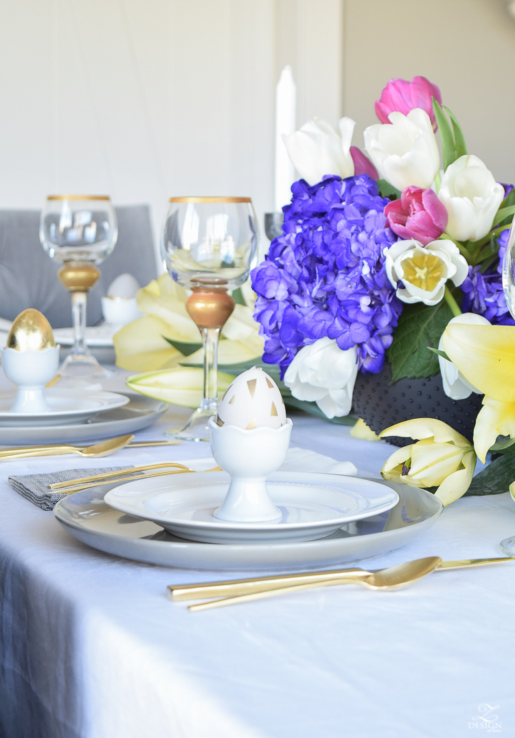 Modern Easter Tablescape Gold Floor Mirror Juju Hat gold flatware gray dishes white linen table cloth-3