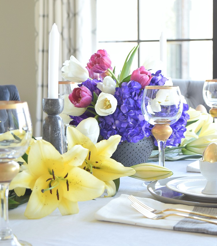 Modern Easter Tablescape yellow lillies purple hydrangeas white beaded dishes gold flatware-CF