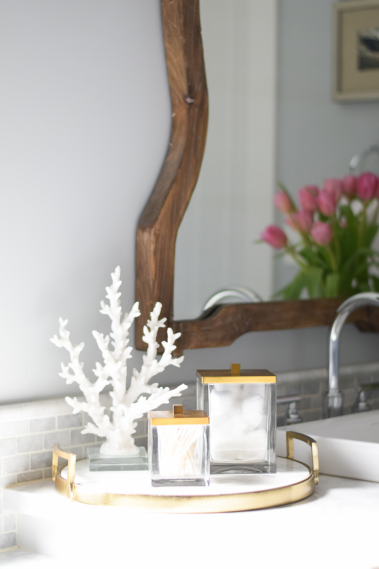 spring bathroom refresh brass and marble accessories coral with acyrlic base wooden mirror white carrara marble image of benjamin more silver lake paint color-3