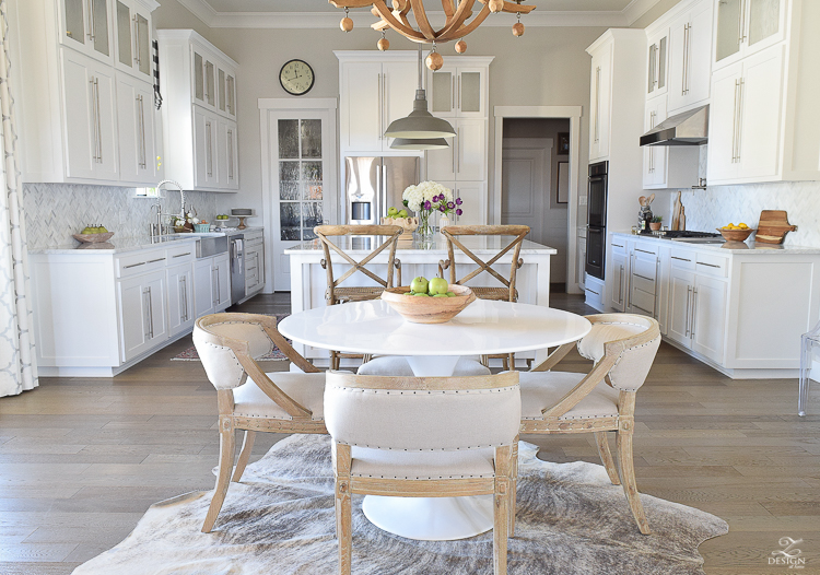 white farmhouse kitchen zdesign at home spring tour vintage barn pendants caitlin wilson rugs gray wood floors white cabinets SW on the rocks paint-2