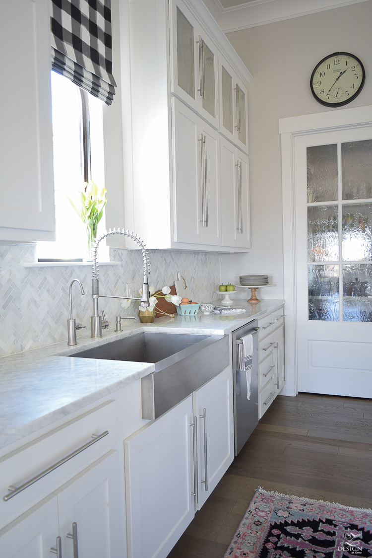 white farmhouse kitchen zdesign at home spring tour vintage barn pendants caitlin wilson rugs gray wood floors white cabinets SW on the rocks paint-5