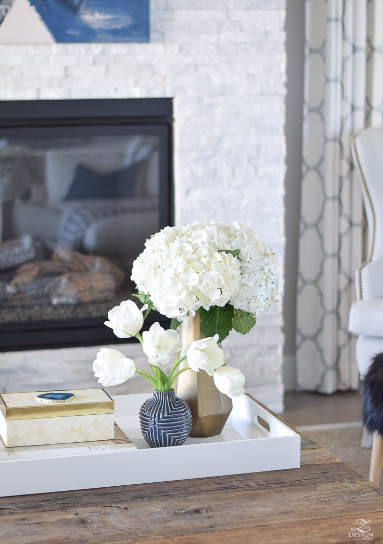 zdesign at home spring tour west elm blue patterned vase brass faceted vase white acrylic tray coffee table styling bone box white hydrangeas and tulips-1-2