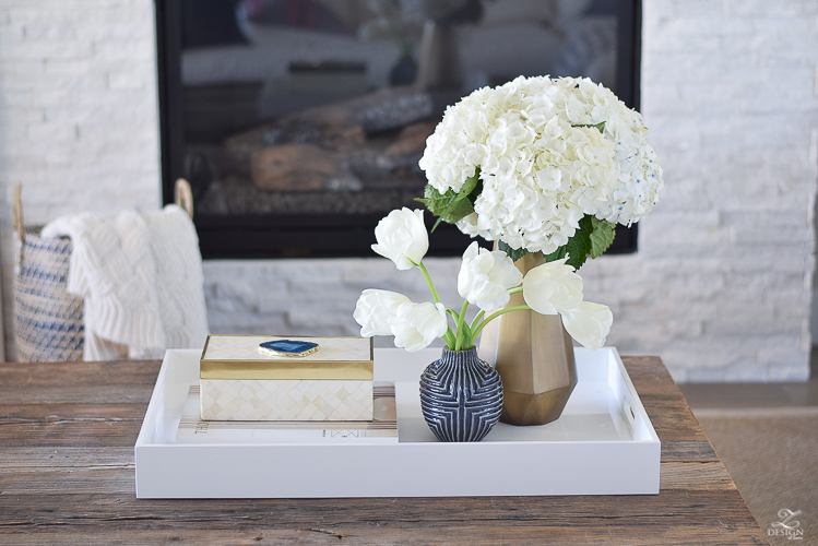 zdesign at home spring tour west elm blue patterned vase brass faceted vase white acrylic tray coffee table styling bone box white hydrangeas and tulips-2