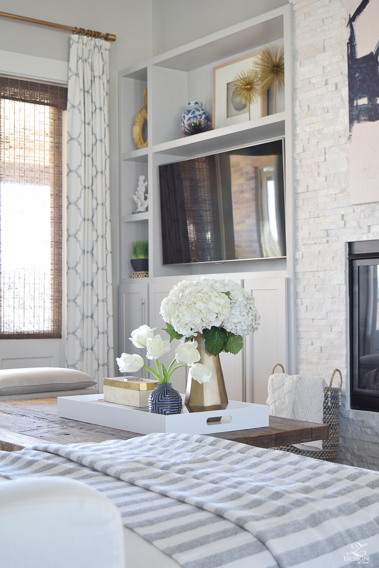 zdesign at home spring tour west elm blue patterned vase brass faceted vase white acrylic tray coffee table styling bone box white hydrangeas and tulips-3