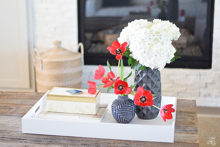 how to make a cozy and inviting home with flowers round gold mirror sw on the rocks modern rustic console table marble and brass lamps baskets under console-2