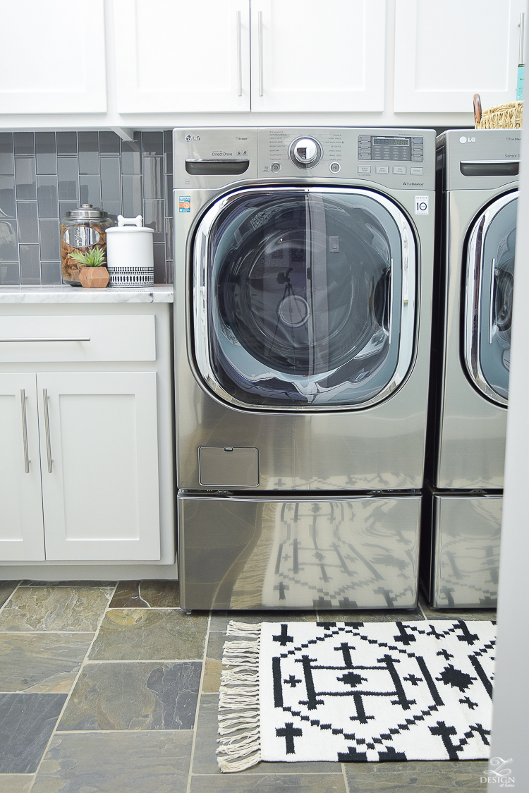 Laundry room ideas stainless LG washer and dryer slate flooring stainless bar pulls delta chrome faucet stainless sink-1