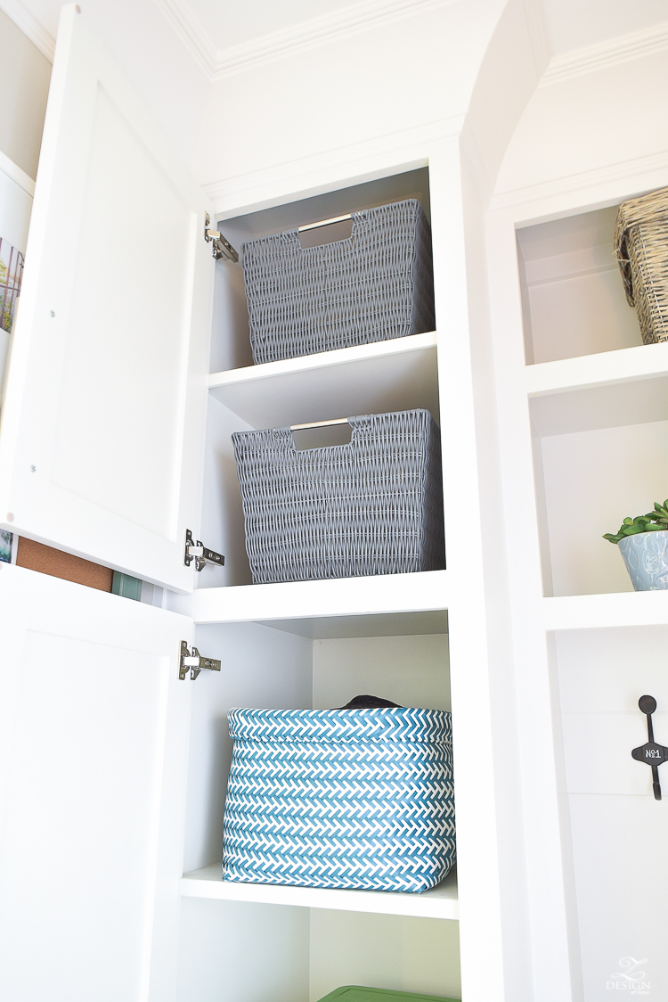 small mud room with pet storage and organization for dog food dog food bowl in drawer white shaker cabinets-2