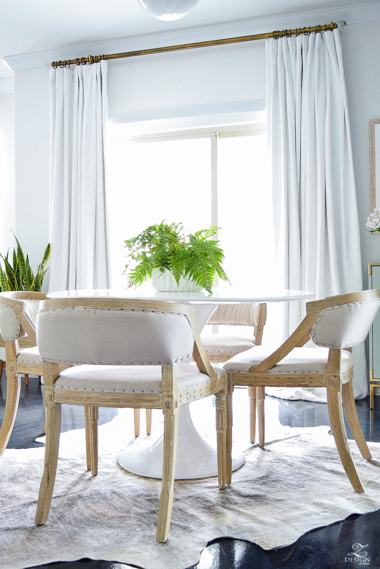 zdesign at home summer home tour white tulip table white linen drapes with brass rods black concrete floors modern white fluted pot-1